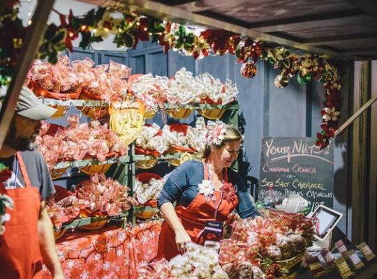 picture of a women selling groceries One of the monthly events in Dallas