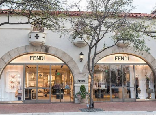 Exterior view of the Fendi shop in Dallas, Texas, showcasing luxury storefront design with iconic branding and elegant window displays.