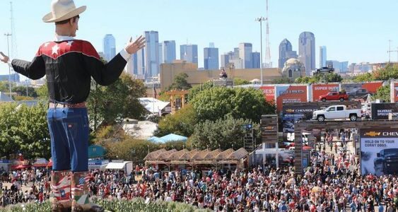 huge statue of cowboy in state fair of Texas One of the monthly events in Dallas