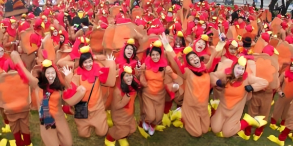 People dressed like turkey participate in the event in Dallas