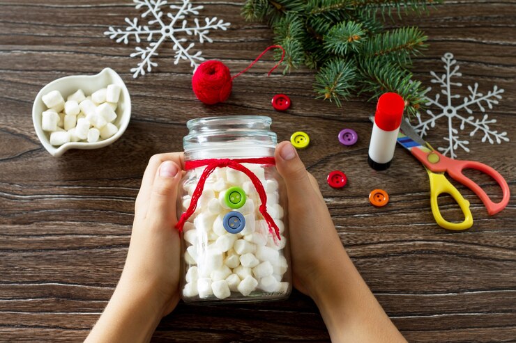 child making Christmas handmade crafts, one of the activity from the Dallas winter bucket. 