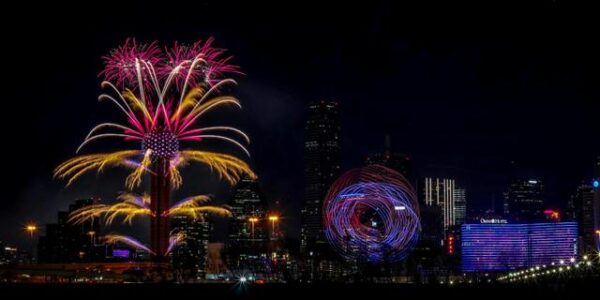 picture of reunion tower showing fire works.