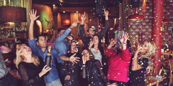 people enjoying in a party to celebrate new years eve in Dallas.