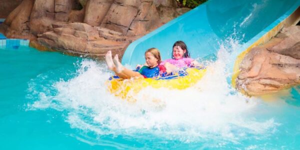 people enjoying water slides in water parks. Top Water Park Dallas